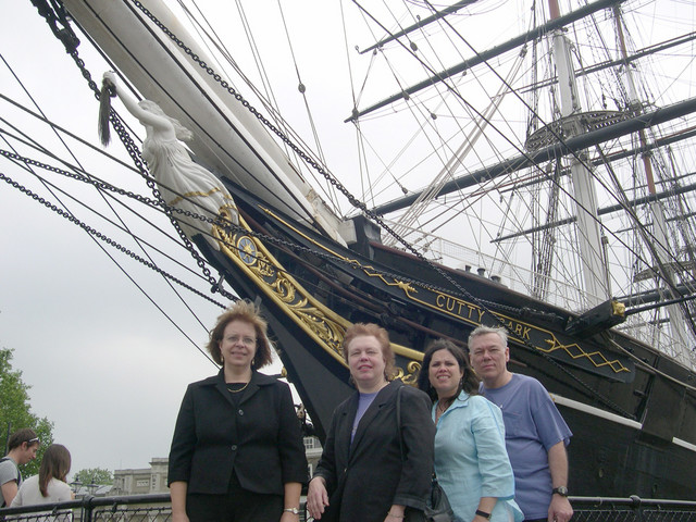 Windblown in front of the last clipper ship, The Cutty Sark, built in Scotland in the 19th century, now in Greenwich.