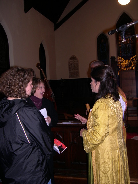 Rebecca chats with two audience members at the Christmas concert