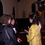 Rebecca chats with two audience members at the Christmas concert