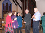 Mary Lou Paschal and Richard Kingston talk with ensemble members following a concert a St. Martin's Episcopal, Charlotte, 2003