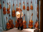 Holly with her viol and all the other viols - London Harpsichord Centre