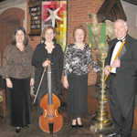 CPM with banner and other church items inside the church