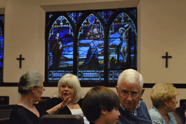 Rebecca's dad speaks to his grandson before the concert.